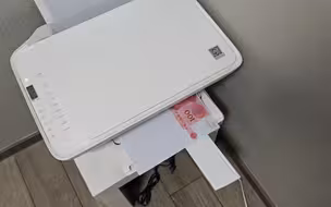 据说钞票上的欧姆龙环会让复印机拒绝复印？实践一下看看。