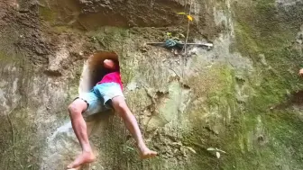 这才是真资格的极品牛人，在光溜溜的悬崖凿山洞，在里面安全居住