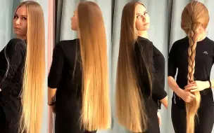 Julia穿着一身黑色衣服，那头金色长发非常显眼，真是太美了